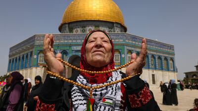 A Palestinian Muslim devotee arrives at the compound of Al Aqsa Mosque in Jerusalem for the third Friday noon prayer of this year's Ramadan. AFP
