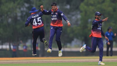 Nepal players celebrate a wicket at the Bayuemas Oval
