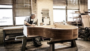 The making of a Steinway begins with planks and patience, the wooden rim of each piano bent, shaped, then left to rest for 100 days. Photo: Steinway & Sons