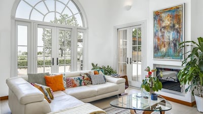 The light pours in amid the pristine white walls. Courtesy LuxuryProperty.com