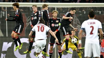 Bayer Leverkusen, in black, pictured during their Uefa Champions League first-leg round of 16 match against Paris Saint-Germain on February 18, 2014, have lost five straight games in all competitions and eight of their last 10 Bundesliga matches. Sascha Schuermann / AFP