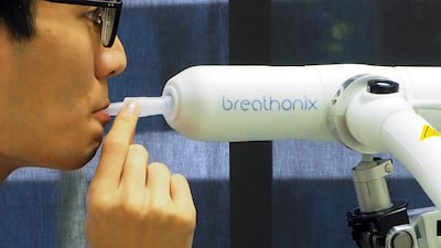 The BreFence Go breathalyser can deliver Covid-19 results within a minute, said Breathonix, the company that designed it. Reuters