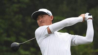 Li Haotong of China hits a shot during the final round of the Volvo China Open golf tournament in Beijing on May 1, 2016. Greg Baker / AP Photo