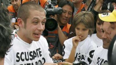 Yamaha's Valentino Rossi celebrates winning this year's Japan Motorcycle Grand Prix at Twin Ring Motegi circuit. The win ensured the Italian rider claimed his sixth world title.
