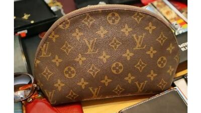 Fake luxury brands, like this Louis Vutton bag confiscated from a shop in Dubai, might fetch top dollar but they are sorry stand-ins for lesser-known brands of quality, writes one reader. (Paulo Vecina / The National)