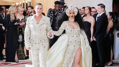 Jeremy Scott and Cardi B in Moschino at the 2018 Met Gala. Reuters