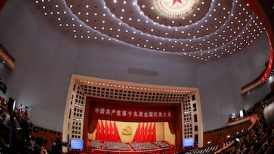 "The great rejuvenation of the Chinese nation is no walk in the park or mere drum-beating and gong-clanging. The whole party must be prepared to make ever more difficult and harder efforts," Xi told hundreds of delegates. How Hwee Young / EPA