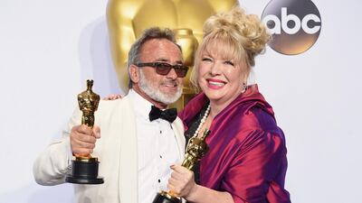 Production designers Colin Gibson, left, and Lisa Thompson, winners of Best Production Design for Mad Max, pose in the press room during the 88th Annual Academy Awards in Hollywood, California. Jason Merritt / Getty Images / AFP