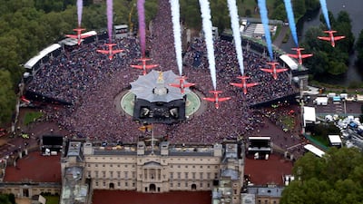The RAF Red Arrows fly over Buckingham Palace in London, marking Queen Elizabeth II's diamond jubilee celebrations in 2012. PA