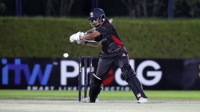 UAE's Esha Oza plays a shot during the T20 international against Hong Kong at Malek Cricket ground in Ajman. UAE won by 28 runs.All photos Pawan Singh / The National