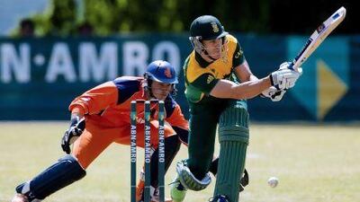 Francois du Plessis, right, provided able support to JP Duminy as they hit 144 runs in last 10 overs against the Dutch at Amstelveen. Robin van Lonkhuihsen / AFP