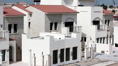 It already comprises 123 villas and town houses, all with identical pink tiled roofs. The second phase adds 55 villas. Christopher Pike / The National