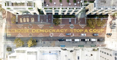 A mural is painted in downtown Oakland, California, this week - not long after the US presidential election. AFP