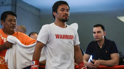 Manny Pacquiao takes part in a training session at a gym in Kuala Lumpur ahead of his WBA world welterweight bout against Argentina's Lucas Matthysse on July 15. EPA
