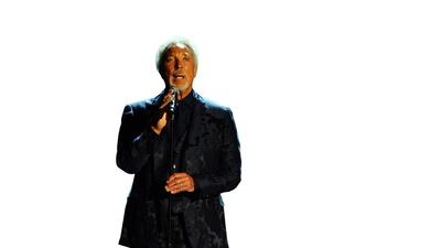 Tom Jones performs on stage at the 2015 MusiCares Person of the Year show at the Los Angeles Convention Center on Friday, Feb. 6, 2015, in Los Angeles. (Photo by Vince Bucci/Invision/AP)