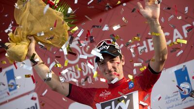Elia Viviani celebrates with the leader's red jersey on Friday after winning Stage 2 of the Abu Dhabi Tour. Claudio Peri / EPA