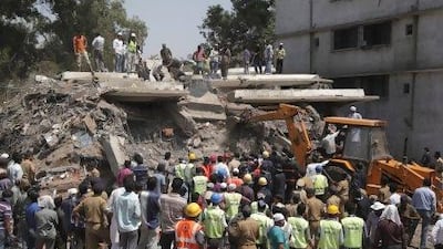 Rescue workers pulled a number of survivors from the debris after an unauthorised building collapsed in Thane district on the oustskirts of Mumbai.