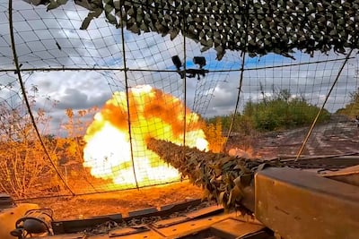 A Russian tank fires towards Ukrainian forces, with the war having raged since February 2022. AP