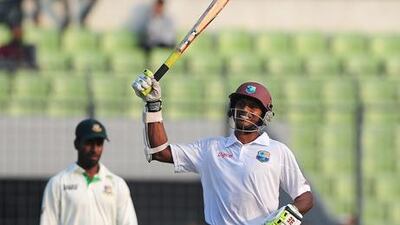 Shivnarine Chanderpaul celebrates his century for the West Indies against Bangladesh