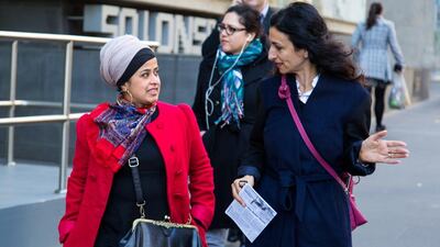 12:31pm - After her meeting with the immigration department, Tasmeen walks down Lonsdale Street in Melbourne with Joumanah El Matrah, chief executive of Australian Muslim Women’s Centre for Human Rights, as they prepare for their next meeting.