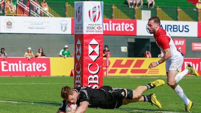 Scott Curry of New Zealand scores against France on Day 2 at the Dubai Rugby Sevens. Victor Besa for The National