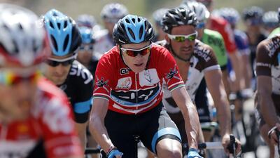 epa04097456 British rider and overall winner Christopher Froome, center, of the Sky Procycling team, in action during the sixth and final stage of the Tour of Oman cycling race on February 23, 2014. YOAN VALAT / EPA