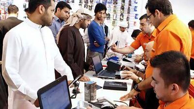 Customers queue at retailer Axiom Telecom, which was among the first in the region to sell the Blackberry Z10 smartphone. Courtesy Axiom Telecom