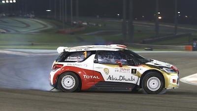 Sheikh Khalid bin Faisal Al Qassimi and co-driver Chris Patterson hustle their Citroen DS3 rally car along at Yas Marina Circuit for the first stage of the Abu Dhabi Rally. Ravindranath K / The National
