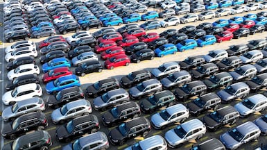 Cars wait to be shipped for export at a port in Lianyungang, in eastern China's Jiangsu province. AFP