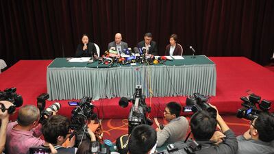 Hugh Dunleavy, second left, and Ignatius Ong, second right from Malaysia Airlines speak during a press conference in Beijing, China. ChinaFotoPress / ChinaFotoPress via Getty Images