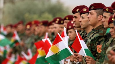 Iraqi Kurdish Peshmerga take part in a gathering to urge people to vote in an independence referendum in Erbil, the capital of the autonomous Kurdish region. AFP