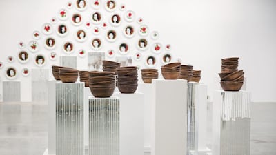 Art installation conceived by Yashar Samimi Mofakham with Tarlan Rafiee's work in the background at 30 Years exhibition at Jamm Art Gallery. Courtesy Tarren Evans