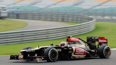 Romain Grosjean, Lotus, France. After a crash-heavy 2012 the Frenchman has dialled back the aggression and has made fewer errors. Was outshone by Raikkonen earlier in 2013, but has raised his game in the second half of the campaign and has been a genuine contender for victory in four races. Prakash Sing / AFP