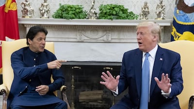 Donald Trump speaks alongside Imran Khan during a meeting in the Oval Office of the White House. Bloomberg