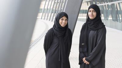 The volunteering experience had a profound effect on students Latifa Al Ruwahi, left, and Khawla Al Khalifi. Irene Garcia Leon for The National
