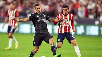 Angel Di Maria controls the ball away from Chivas de Guadalajara forward Sebastian Perez. USA TODAY Sports