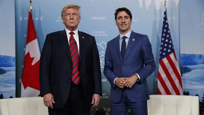 US President Donald Trump and Canadian Prime Minister Justin Trudeau at the G7 summit in Charlevoix, Canada. Evan Vucci / AP