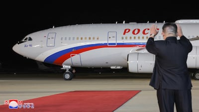 North Korean leader Kim Jong-un waves at Russian President Vladimir Putin's plane as it leaves Pyongyang. Reuters