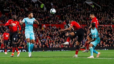 Manchester United's Alexis Sanchez heads in their winning goal. Reuters