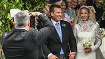 Princess Anne's son Peter Phillips and Harriet Sperling leave following their wedding at All Saints Church in Kemble on Saturday. Reuters