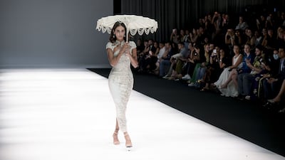 Models showcase a collaboration between Kresha Bajaj and Alok Lodha Jewels at Dubai Fashion Week. Photo: Getty Images