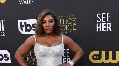 Tennis star Serena Williams arrives in a metallic Atelier Versace gown. AFP