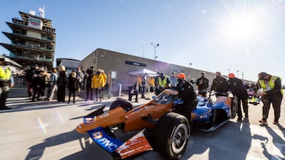 The car of Chip Ganassi Racing driver Scott Dixon is pulled into the pits before the 105th running of the Indianapolis 500. USA TODAY Sports