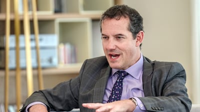 UK ambassador Edward Hobart has praised citizens for the 'sheer grit' shown since Iran launched its attacks. Victor Besa / The National