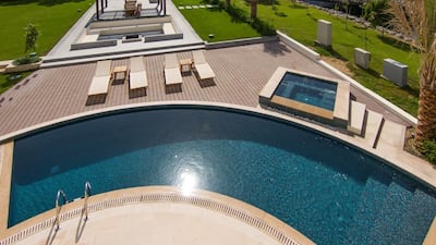 The home comes with five en-suite bedrooms, an upstairs study and family room with a terrace, a separate ground floor formal living and dining areas with a family living area, a family kitchen and a service kitchen, a laundry, one basement room with a bathroom, a self-contained maid’s living quarters, three-car garage, powder room, two private cooled and covered courtyards, landscaped gardens, a swimming pool, a plunge pool, a barbeque area and plenty of rooftop terraces. Courtesy Luxhabitat