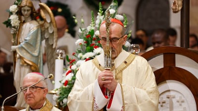 Vatican’s Latin Patriarchate in Jerusalem Cardinal Pierbattista Pizzaballa leads a Christmas midnight mass at the Church of the Nativity. EPA