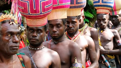 In this Nov. 29, 2019, file photo, the Upe members wait to vote in the Bougainville referendum in Teau, Bougainville, Papua New Guinea. AP