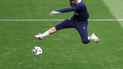 France forward Kylian Mbappe scores during a training session at the Home Deluxe Arena Stadium. AFP