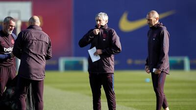 Barcelona manager Quique Setien and his staff at the beginning on the training session. Reuters