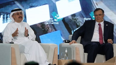 Aramco president and chief executive Amin Nasser with Patrick Pouyanne, chairman and chief executive of TotalEnergies, during a session of the Saudi Green Initiative forum in Riyadh. AFP